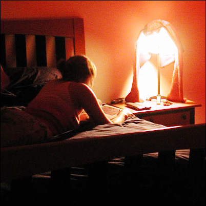 woman_writing_diary_on_bed